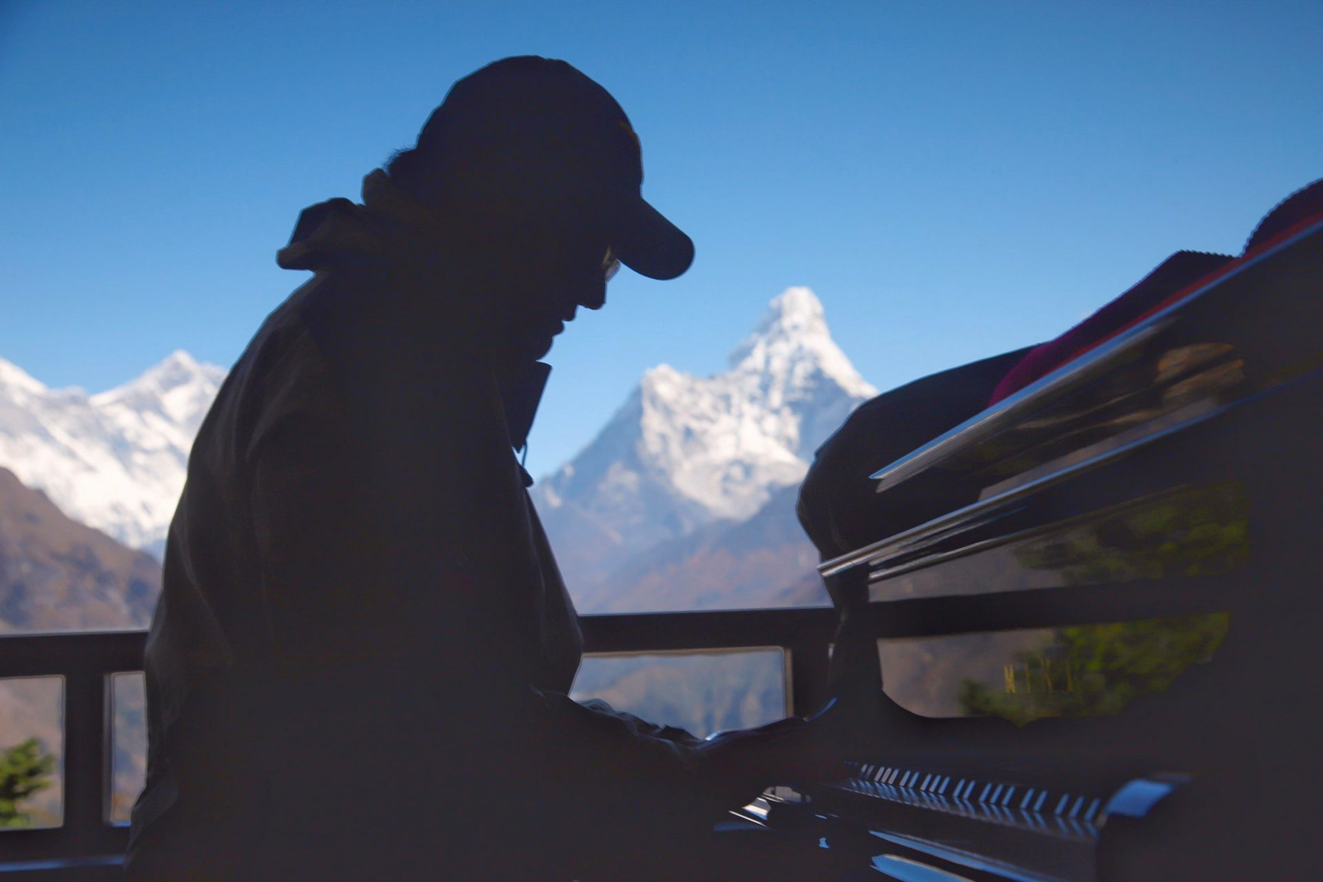 Playing grand piano at Hotel Everest View